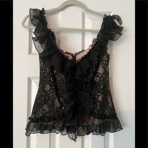 Black and nude ruffled dress top w zippered back.  Size small